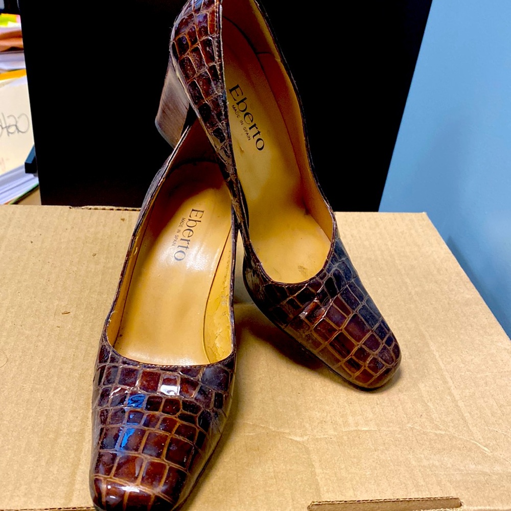 Women’s crocodile - style leather - ish pumps.